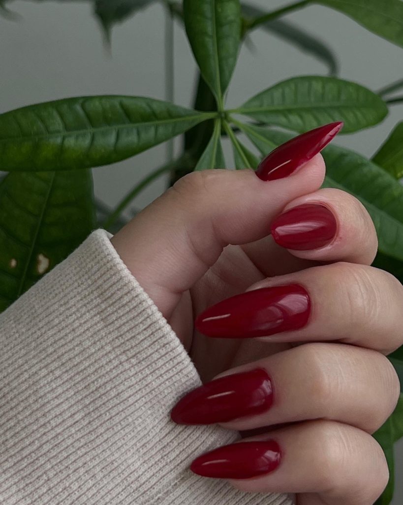 e-file manicure with red polish